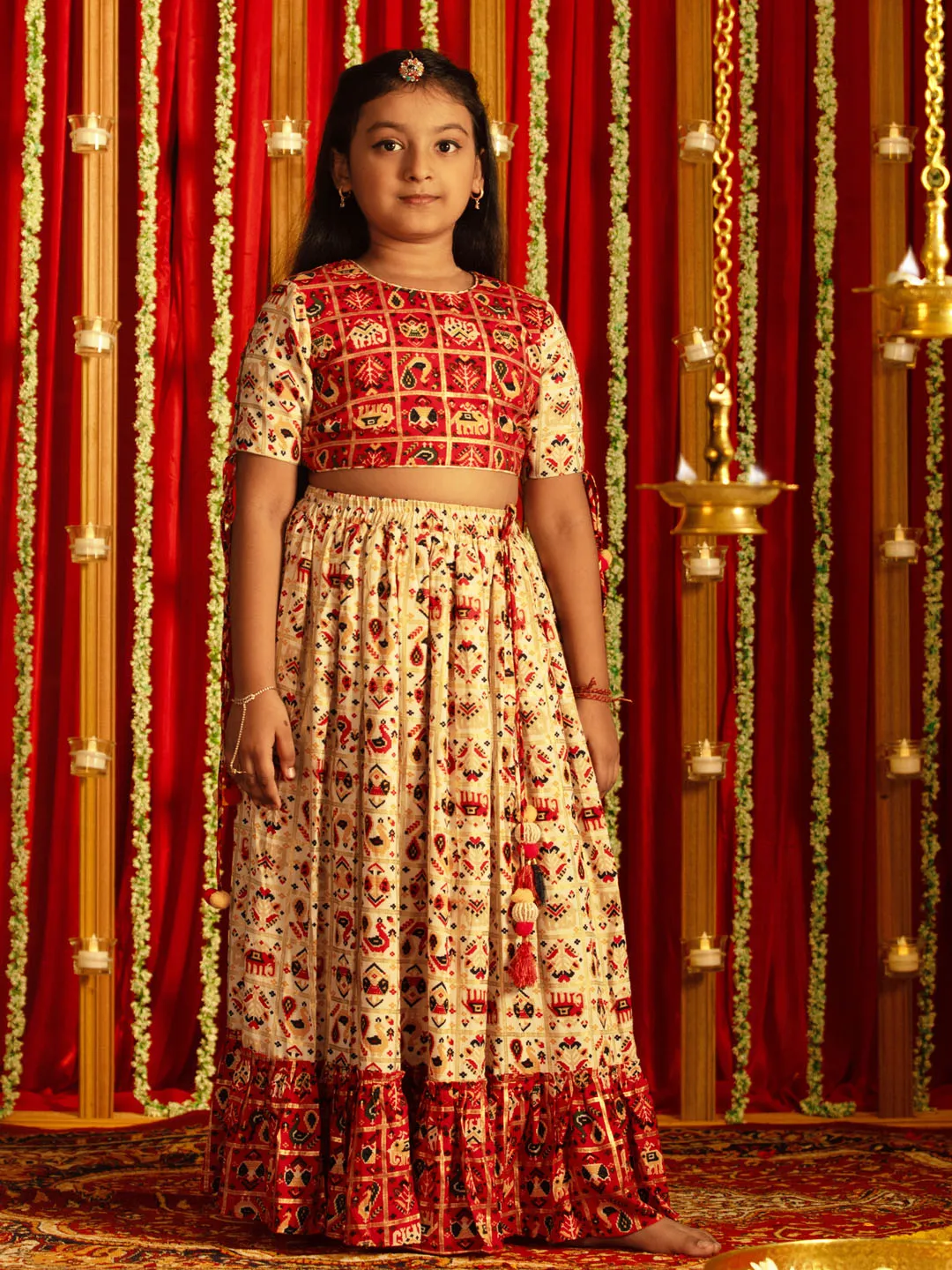 Jashvi Girls' Red And Cream Patola Print Lehenga Set