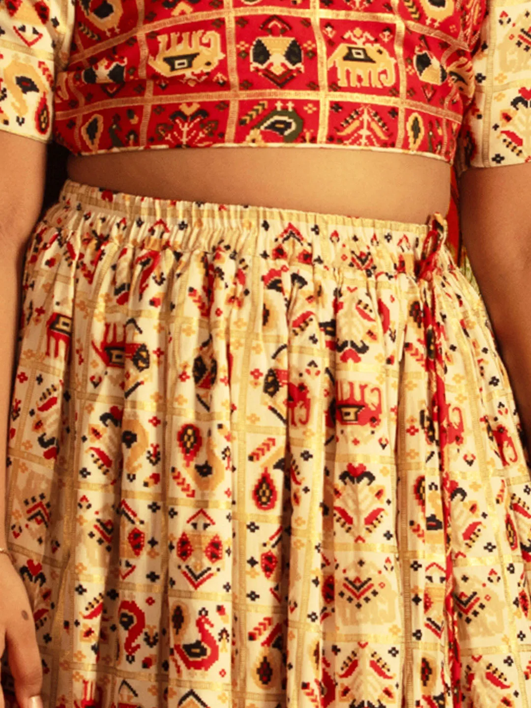 Jashvi Girls' Red And Cream Patola Print Lehenga Set